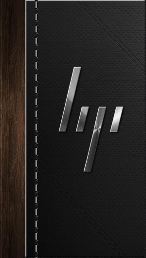 HP-light metal logo on leather-wood background-2.jpg