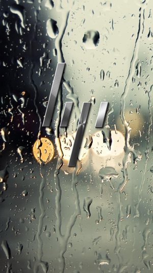 HP metal logo-rain glass background.jpg